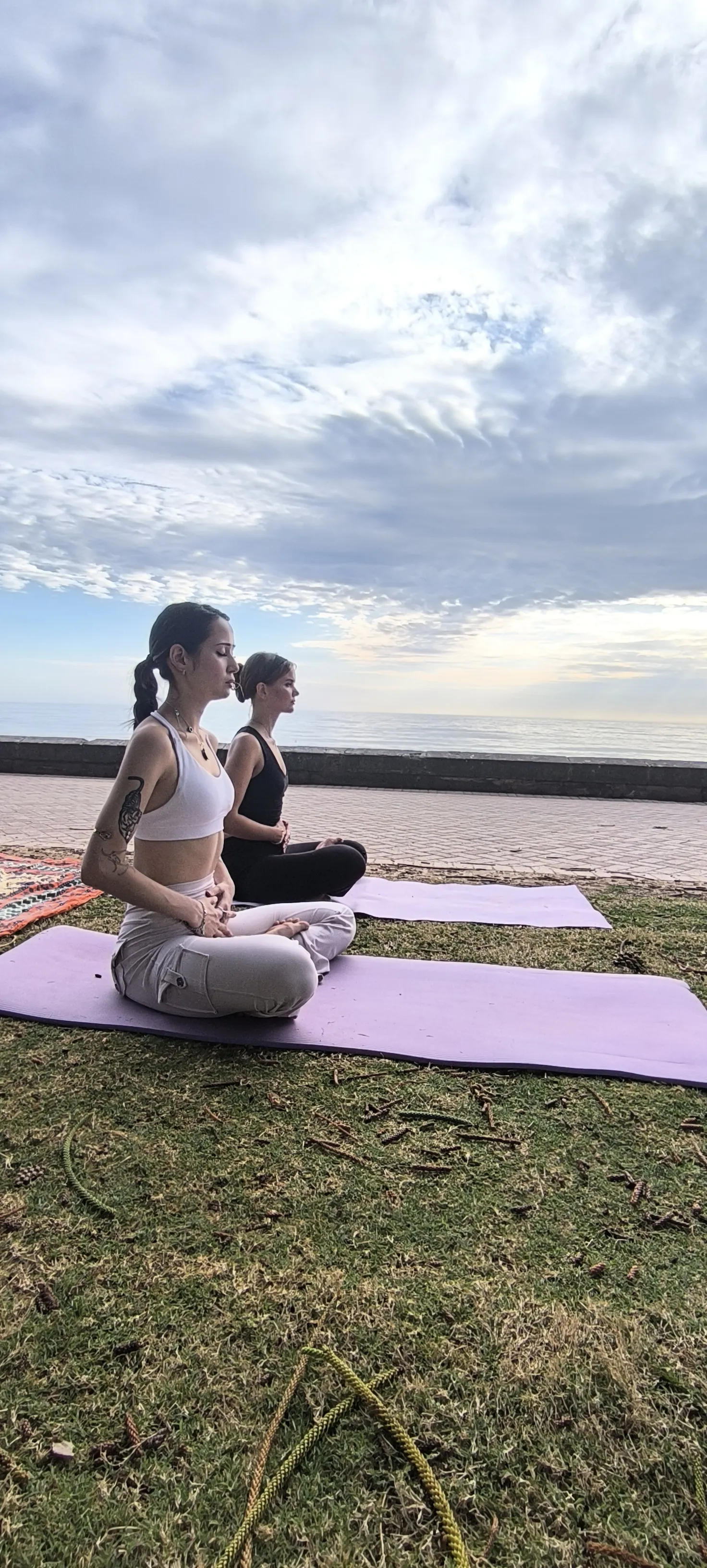 Women sharing joyful moments during Shakti Sisterhood yoga retreat