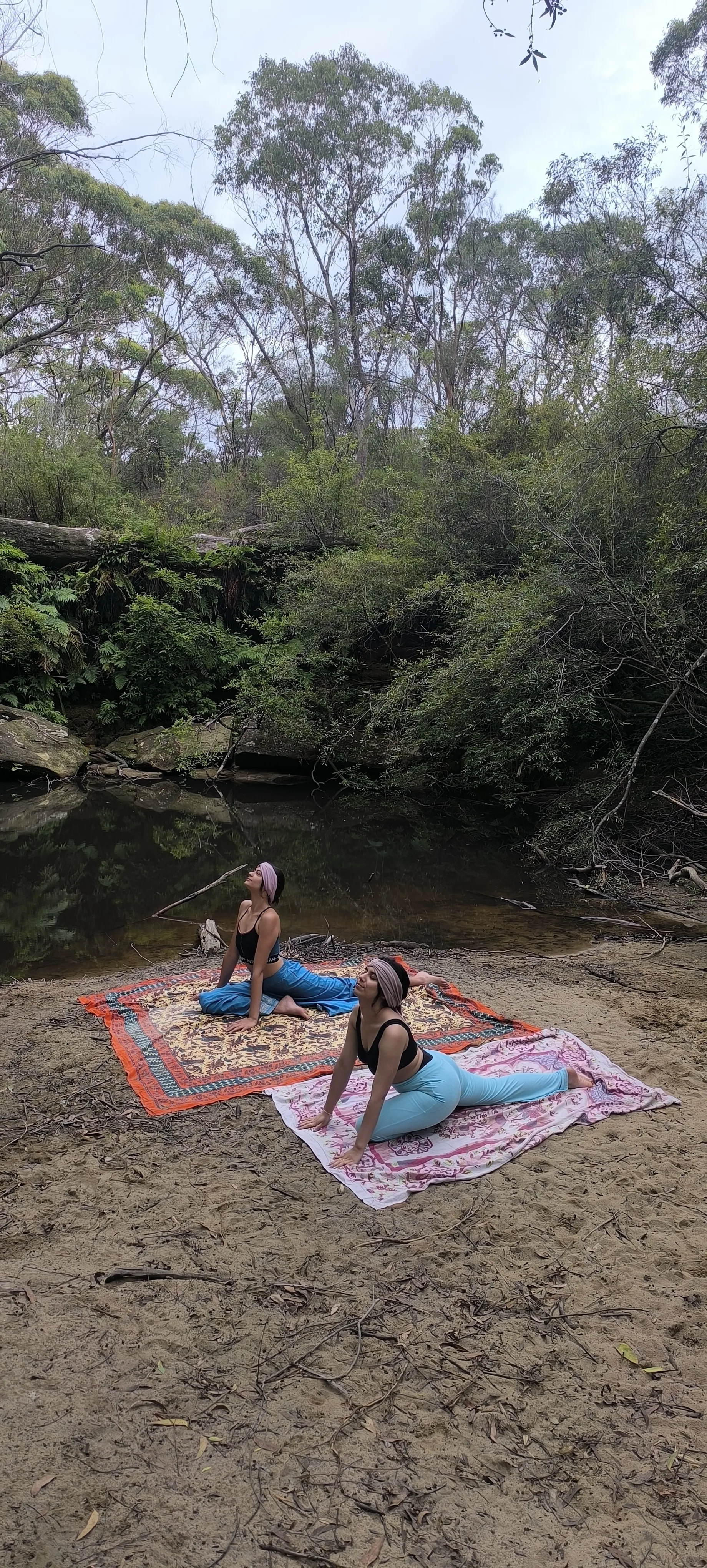 Yoga students in child's pose during gentle flow class