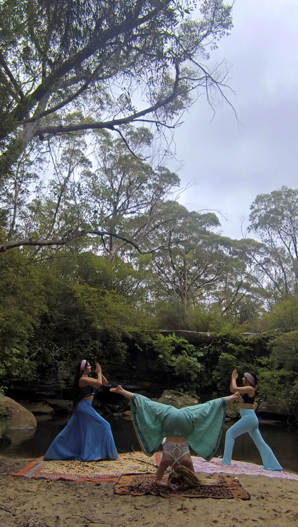 Group yoga flow during Shakti Sisterhood gathering