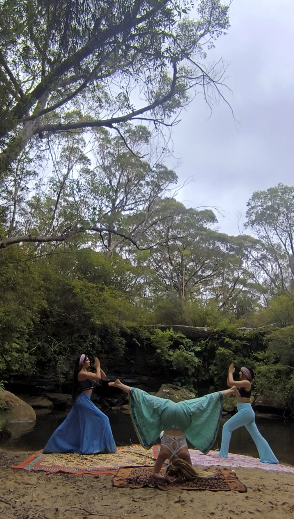 Group yoga flow with synchronized movement and breathing