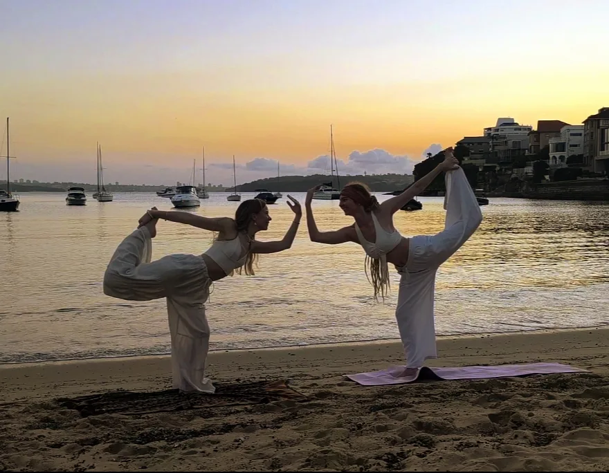 Instructor demonstrating hip-opening sequence for hormonal balance