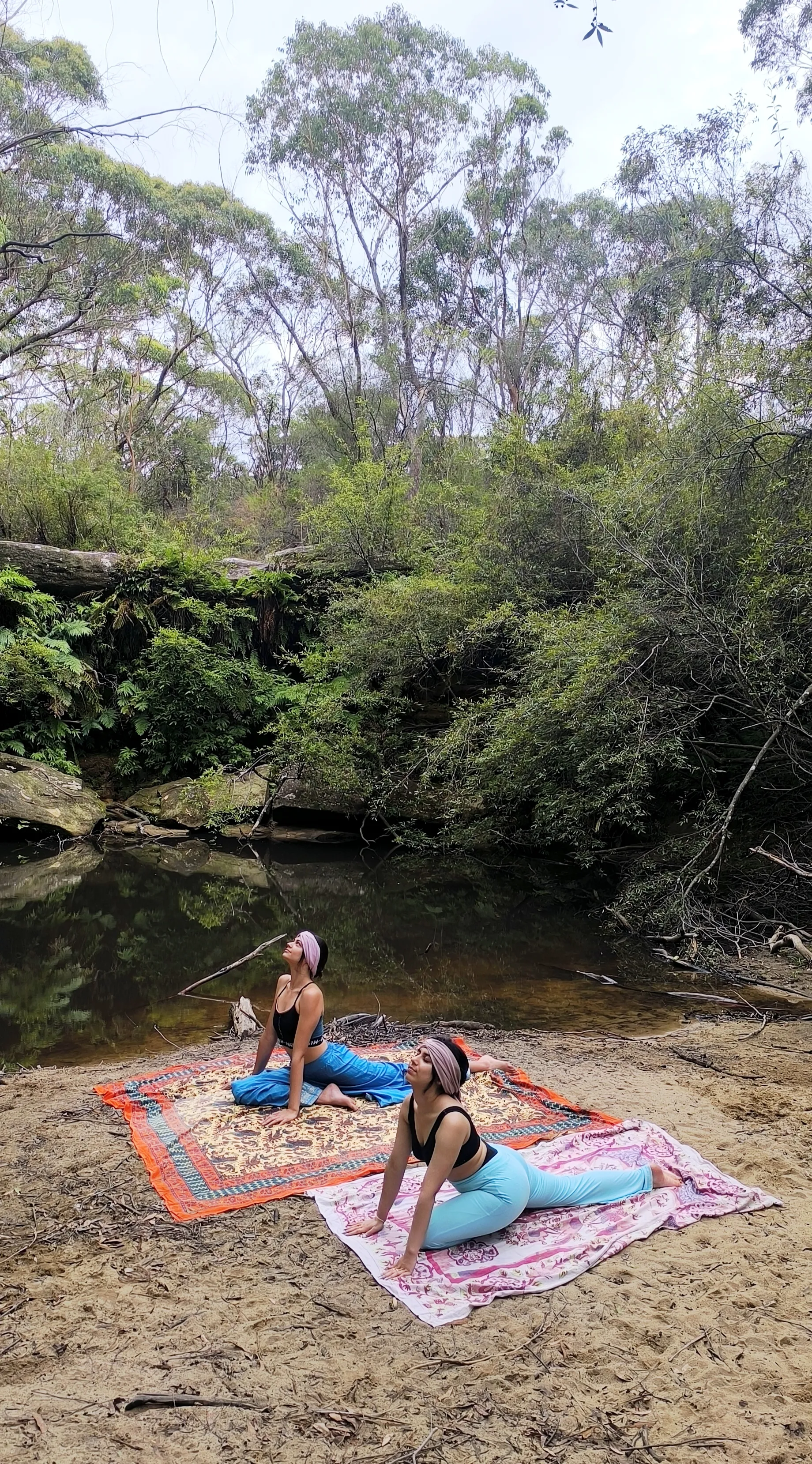 Women gathered in a supportive yoga circle at Shakti Sisterhood