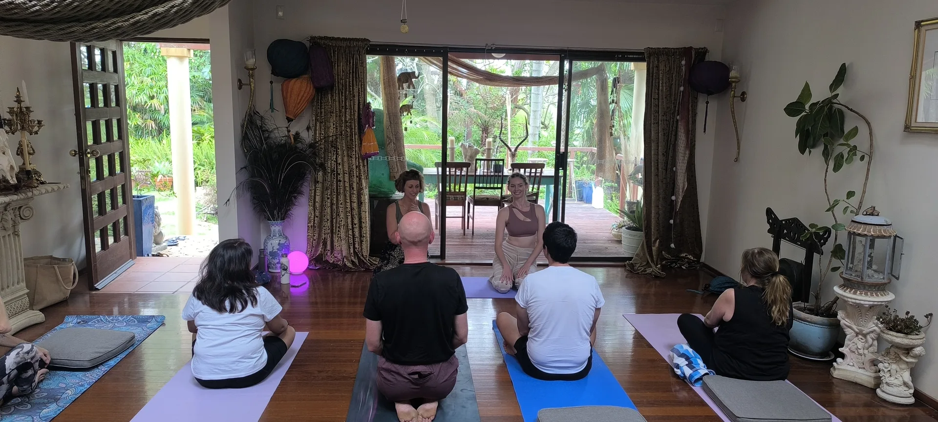 Hands-on adjustment during one-on-one yoga guidance