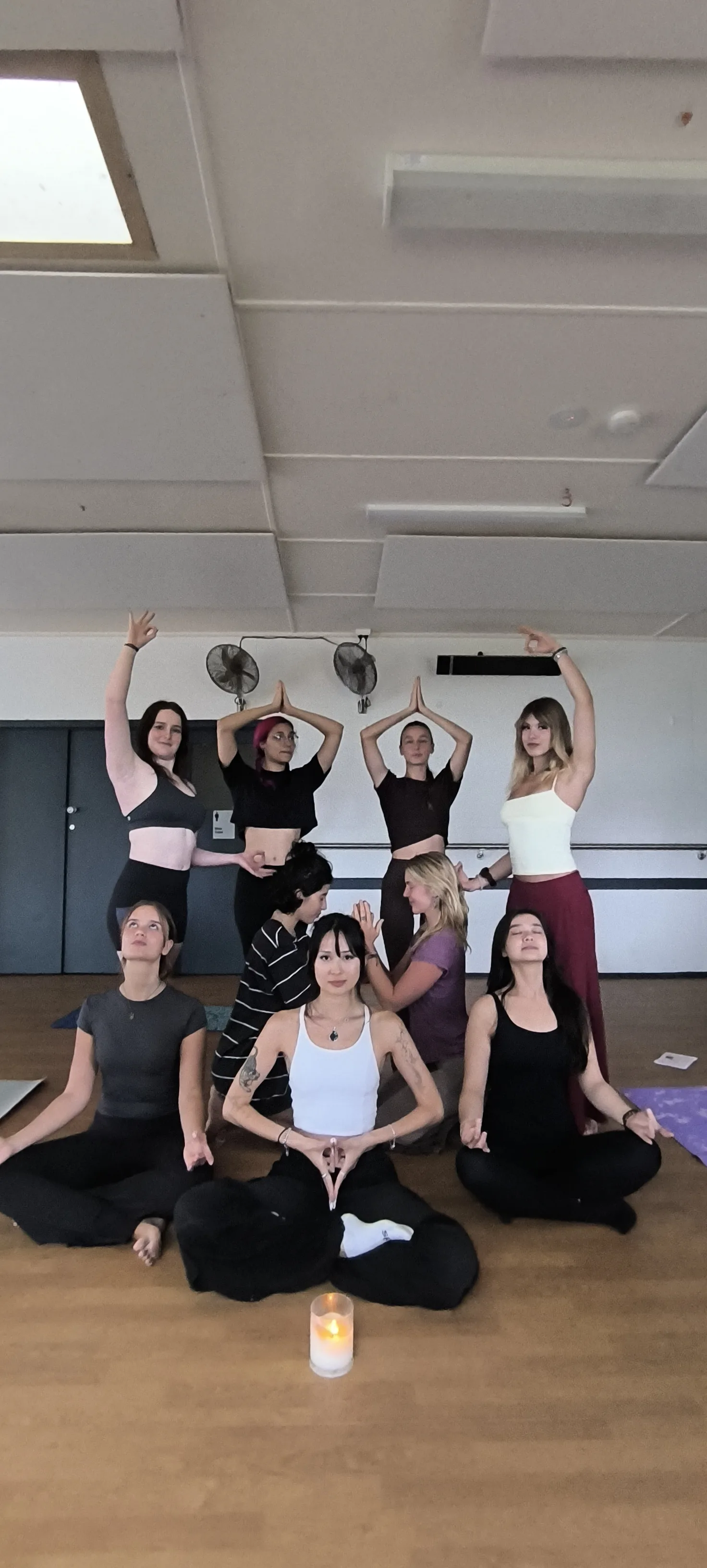 Serene yoga instructor in standing pose at Mukti Yog